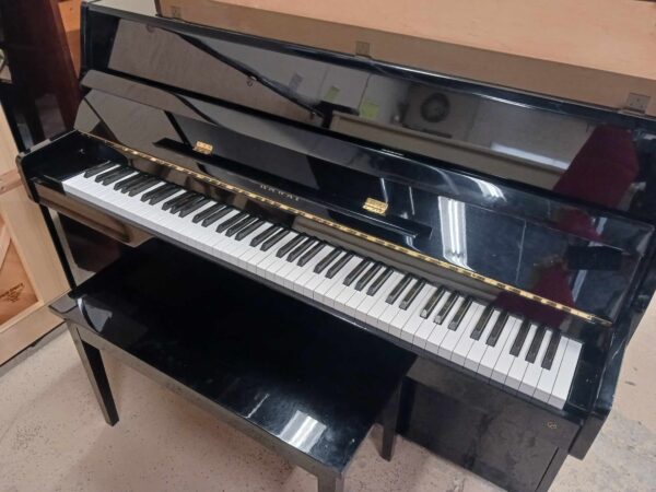 pre-owned Kawai K-15 upright piano with ebony polish finish