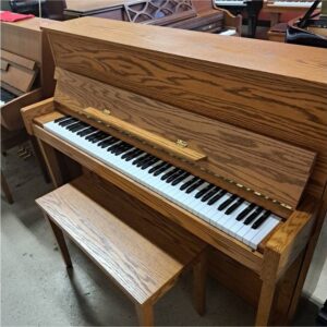 Kawai CX-5A upright piano in a satin pine finish